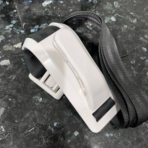 Maternity seatbelt adjuster